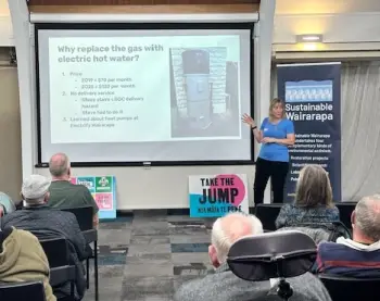 Erica Jar presenting about heat pump hot water at "Why Electrify Wairarapa?", an Electrify Wairarapa event.